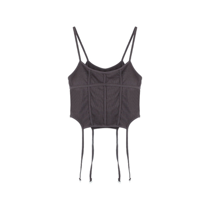 A Woman Wearing A Suspender Vest With A Chest Pad.